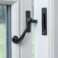 The "Harmony Manor" Window Fastener Mounted on a Classic White Window Frame - Digital Illustration The "Harmony Manor" Window Fastener Mounted on a Classic White Window Frame - Digital Illustration