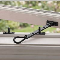 The "Hartlake Park" Cast Iron Window Stay Fitted on a White Open Window Frame - Digital Illustration The "Hartlake Park" Cast Iron Window Stay Fitted on a White Open Window Frame - Digital Illustration