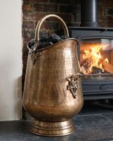 The "Highham Square" Antique Styled Coal Scuttle or Bucket Placed in Front of a Contemporary Fireplace - Digital Illustration