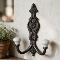 The "Madame Josetta" Vintage Coat hook on a White Textured Wall - Digital Illustration The "Madame Josetta" Vintage Coat hook on a White Textured Wall - Digital Illustration
