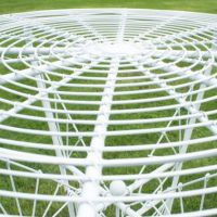 Close-up of the Metal "Swirl" Framework on the Top of the Table