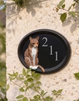 The "Marmalade" Hand Painted Thomas Cat House Sign on a Cream Coloured Pebble Dashed Wall - Digital Illustration The "Marmalade" Hand Painted Thomas Cat House Sign on a Cream Coloured Pebble Dashed Wall - Digital Illustration