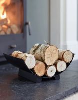 The "Media Luna" Contemporary Log Holder in Front of a Lit Log Burner Stove in a Modern Living Room Interior - Digital Illustration The "Media Luna" Contemporary Log Holder in Front of a Lit Log Burner Stove in a Modern Living Room Interior - Digital Illustration