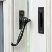 The "Ollerton Avenue" Contemporary Iron Casement Stay Mounted on a Traditional White Wooden Windowframe - Digital Illustration The "Ollerton Avenue" Contemporary Iron Casement Stay Mounted on a Traditional White Wooden Windowframe - Digital Illustration