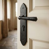 The "Rosa" Black Gothic Lever Euro Lock Set on a Cream Door on a Stone Tiled Entrance Hallway - Digital Illustration The "Rosa" Black Gothic Lever Euro Lock Set on a Cream Door on a Stone Tiled Entrance Hallway - Digital Illustration