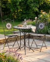 The "Santa Oliva" Foldable 2-Seater Mosaic Dining Set digital illustration dressed table