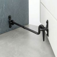 The "Siena" Black Forged Cabin Hook 12" on a White Cabinet Door - Digital Illustration The "Siena" Black Forged Cabin Hook 12" on a White Cabinet Door - Digital Illustration