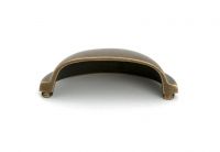 The "Stratford" Traditional Cup Handle in a Burnished Brass Finish on a White Background shown from Underneath
