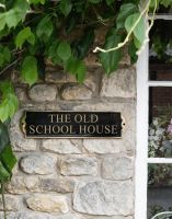 The "The Huntingdon" Modern Brass Sign on the Front of a Quaint Country House - Digital Illustration The "The Huntingdon" Modern Brass Sign on the Front of a Quaint Country House - Digital Illustration