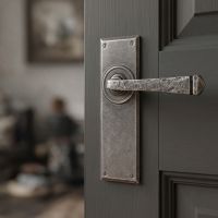The "Thornton" Hammered Pewter Contemporary Door Handles on a Charcoal Grey Door in a Period Home - Digital Illustration .jpg