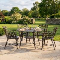 The "Wootton House" 4-Seat Garden Dining Set - Antique Bronze digital illustration dressed table