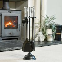 The "York" Aluminium & Black Iron Fireside Companion Set in a Modern Interior Setting next to a Log Burner Stove - Digital Illustration