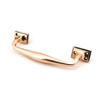 The 230mm Swelled Grip Pull Handle with Roses in Polished Bronze on a White Background The 230mm Swelled Grip Pull Handle with Roses in Polished Bronze on a White Background