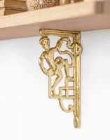 The 25 x 12cm Polished Brass Roman Man Design Bracket Mounted on a Cream Coloured Living Room Wall - Digital Illustration 