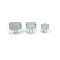 The 25mm Knurled Cabinet Knob (No Rose) in Satin Chrome Alongside Different Sizes
