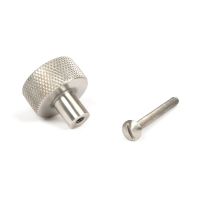 The 25mm Knurled Cabinet Knob (No Rose) in Satin Stainless Steel Shown with Fitting Bolt on a White Background The 25mm Knurled Cabinet Knob (No Rose) in Satin Stainless Steel Shown with Fitting Bolt on a White Background