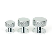 The 25mm Knurled Cabinet Knob on a Plain Rose in Polished Chrome Alongside Different Sizes The 25mm Knurled Cabinet Knob on a Plain Rose in Polished Chrome Alongside Different Sizes