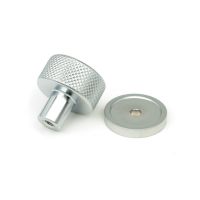 The 25mm Knurled Cabinet Knob on Plain Rose in Satin Chrome Shown from Behind on a White Background The 25mm Knurled Cabinet Knob on Plain Rose in Satin Chrome Shown from Behind on a White Background