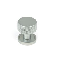 The 25mm Knurled Cabinet Knob on Plain Rose in Satin Chrome Shown Upright on a White Background The 25mm Knurled Cabinet Knob on Plain Rose in Satin Chrome Shown Upright on a White Background