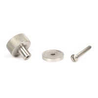 The 25mm Knurled Cabinet Knob on Plain Rose in Satin Stainless Steel Shown with Fitting Bolt on a White Background The 25mm Knurled Cabinet Knob on Plain Rose in Satin Stainless Steel Shown with Fitting Bolt on a White Background