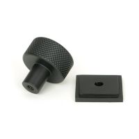 The 25mm Knurled Cabinet Knob on Square Rose in Matt Black Displayed in Separate Sections on a White Background