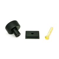 The 25mm Knurled Cabinet Knob on Square Rose in Matt Black Displayed in Separate Sections with Fitting Bolt