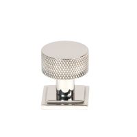 The 25mm Knurled Cabinet Knob on Square Rose in Polished Stainless Steel Shown Upright on a White Background The 25mm Knurled Cabinet Knob on Square Rose in Polished Stainless Steel Shown Upright on a White Background