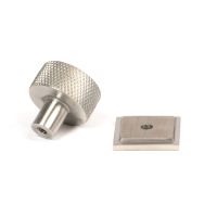 The 25mm Knurled Cabinet Knob on Square Rose in Satin Stainless Steel Shown from Behind with the Rose The 25mm Knurled Cabinet Knob on Square Rose in Satin Stainless Steel Shown from Behind with the Rose