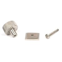 The 25mm Knurled Cabinet Knob on Square Rose in Satin Stainless Steel Shown with Fitting Bolt on a White Background The 25mm Knurled Cabinet Knob on Square Rose in Satin Stainless Steel Shown with Fitting Bolt on a White Background