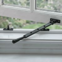 The 296mm 10" Black Four Pin Window Stay in a Black Finish Fitted on a Classic White Open Window - Digital Illustration