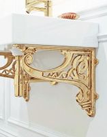 The 30 x 42cm "Celtic" Wall Bracket in a Brass Finish Mounted on a White Kitchen Wall Supporting a Sink - Digital Illustration