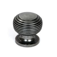 The 30mm "Garrison" Ribbed Beehive Knob in Pewter on a Whitebackground Shown Stood Upright