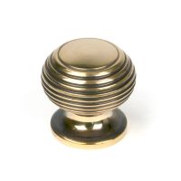 The 30mm Individual Aged Brass Beehive Cabinet Knob Viewed Upright on a White Background