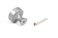 The 32mm "Atelier" Circular Cabinet Knob in Satin Chrome on a White Background Shown From Behind with the Screw