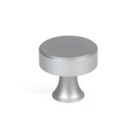 The 32mm "Atelier" Circular Cabinet Knob in Satin Chrome on a White Background Stood Upright 