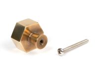 The 32mm "Vanguard" Hexagonal Cabinet Knob in Aged Brass on a White Background Shown from Behind with the Screw