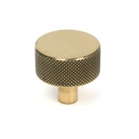 The 32mm Knurled Cabinet Knob (No Rose) in Aged Brass Shown Upright on a White Background The 32mm Knurled Cabinet Knob (No Rose) in Aged Brass Shown Upright on a White Background