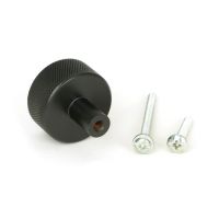 The 32mm Knurled Cabinet Knob (No Rose) in Aged Bronze Displayed with Fittings