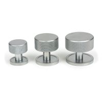 The 32mm Knurled Cabinet Knob on a Plain Rose in Satin Chrome Alongside Different Sizes The 32mm Knurled Cabinet Knob on a Plain Rose in Satin Chrome Alongside Different Sizes