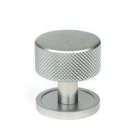 The 32mm Knurled Cabinet Knob on a Plain Rose in Satin Chrome Shown Upright on a White Background The 32mm Knurled Cabinet Knob on a Plain Rose in Satin Chrome Shown Upright on a White Background