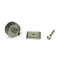 The 32mm Knurled Cabinet Knob on a Square Rose in Pewter Displayed with Fittings The 32mm Knurled Cabinet Knob on a Square Rose in Pewter Displayed with Fittings