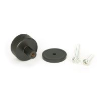 The 32mm Knurled Cabinet Knob on Plain Rose in Aged Bronze Shown with Fitting Bolt on a White Background The 32mm Knurled Cabinet Knob on Plain Rose in Aged Bronze Shown with Fitting Bolt on a White Background