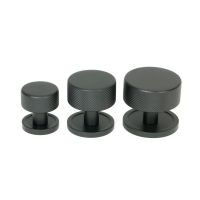 The 32mm Knurled Cabinet Knob on Plain Rose in Matt Black Alongside Different Sizes The 32mm Knurled Cabinet Knob on Plain Rose in Matt Black Alongside Different Sizes