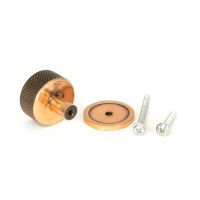 The 32mm Knurled Cabinet Knob on Plain Rose in Polished Bronze Displayed with Fittings The 32mm Knurled Cabinet Knob on Plain Rose in Polished Bronze Displayed with Fittings