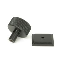 The 32mm Knurled Cabinet Knob on Square Rose in Aged Bronze Shown from Behind on a White Background The 32mm Knurled Cabinet Knob on Square Rose in Aged Bronze Shown from Behind on a White Background