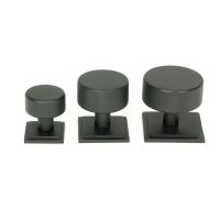 The 32mm Knurled Cabinet Knob on Square Rose in Matt Black Alongside Different Sizes The 32mm Knurled Cabinet Knob on Square Rose in Matt Black Alongside Different Sizes