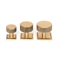 The 32mm Knurled Cabinet Knob on Square Rose in Polished Bronze Alongside Different Sizes The 32mm Knurled Cabinet Knob on Square Rose in Polished Bronze Alongside Different Sizes