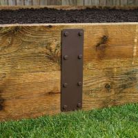 The 350mm Brown Railway Sleeper Straight Joining Plate on a Timber Raised Planter - Digital Illustration The 350mm Brown Railway Sleeper Straight Joining Plate on a Timber Raised Planter - Digital Illustration