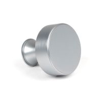 The 38mm "Atelier" Circular Cabinet Knob in Satin Chrome on a White Background Shown Side on