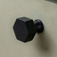The 38mm "Vanguard" Hexagonal Cabinet Knob in Matt Black Mounted on a Kitchen Cupboard Drawer - Digital Illustration The 38mm "Vanguard" Hexagonal Cabinet Knob in Matt Black Mounted on a Kitchen Cupboard Drawer - Digital Illustration